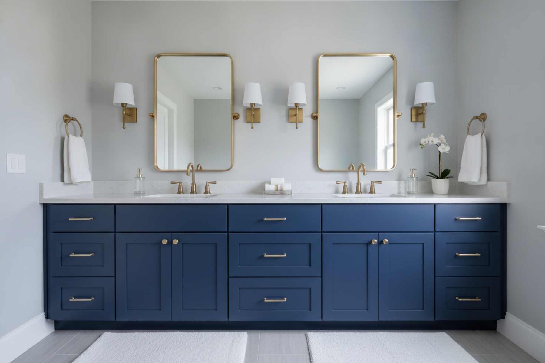 Double vanity with quartz top and framed mirrors